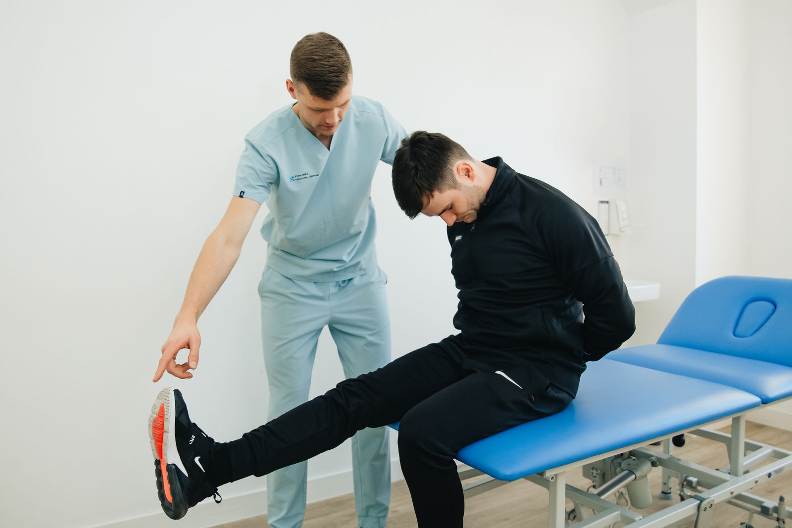 A patient doing a rehab exercise with a resistance band