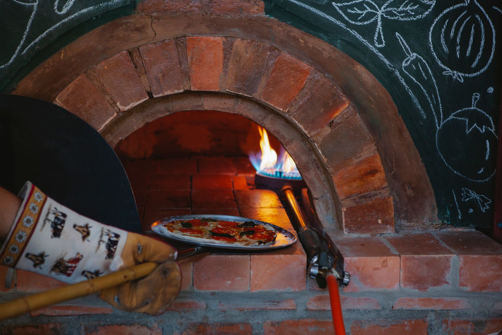 Illustration of the pizza oven in the pizzeria