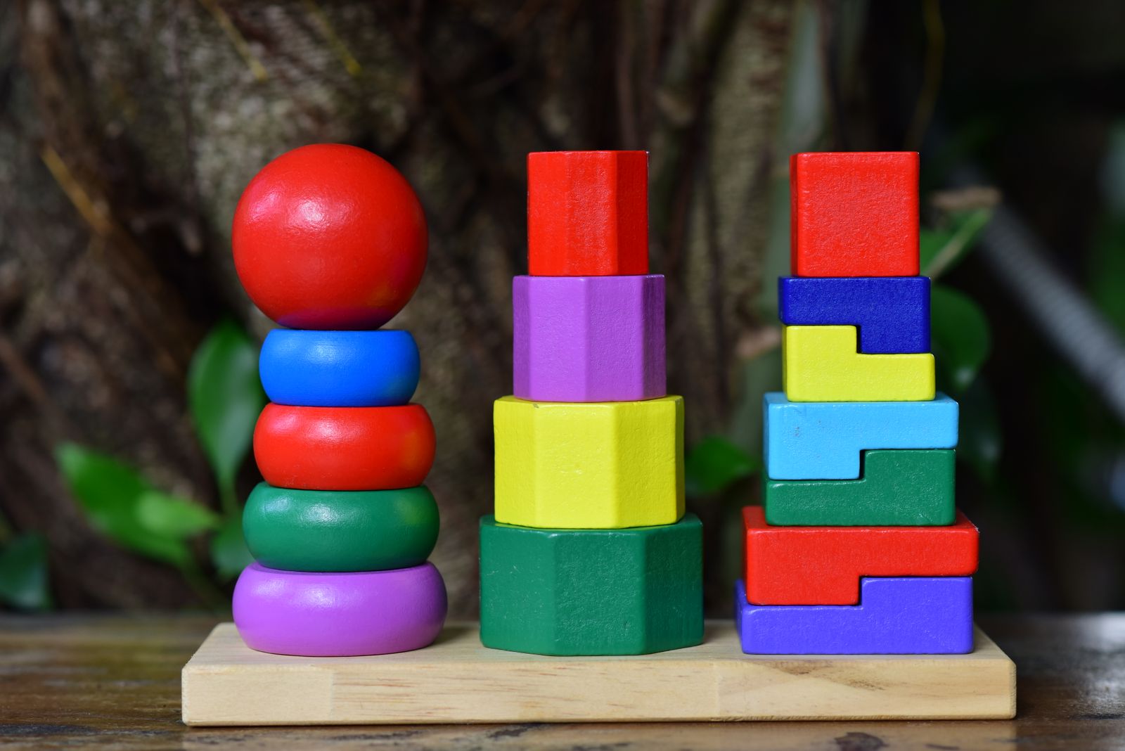 Illustration of stacking rings and wooden toy blocks
