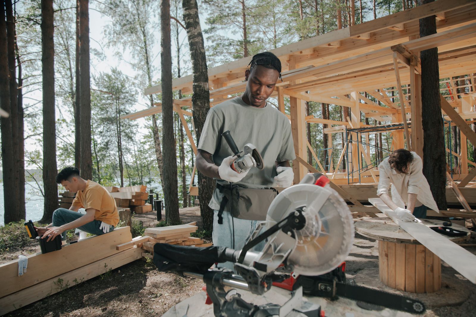 Builders at work on a timber-frame build