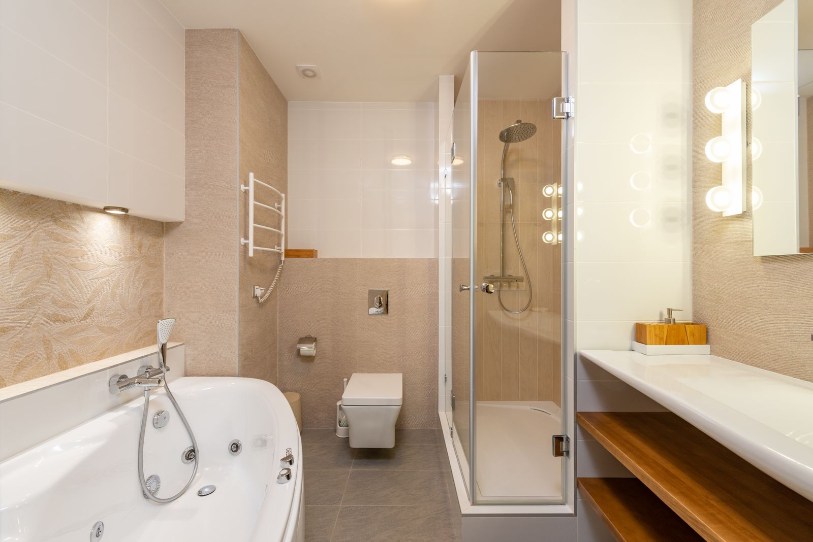 A newly fitted bathroom with a bath and a walk-in shower