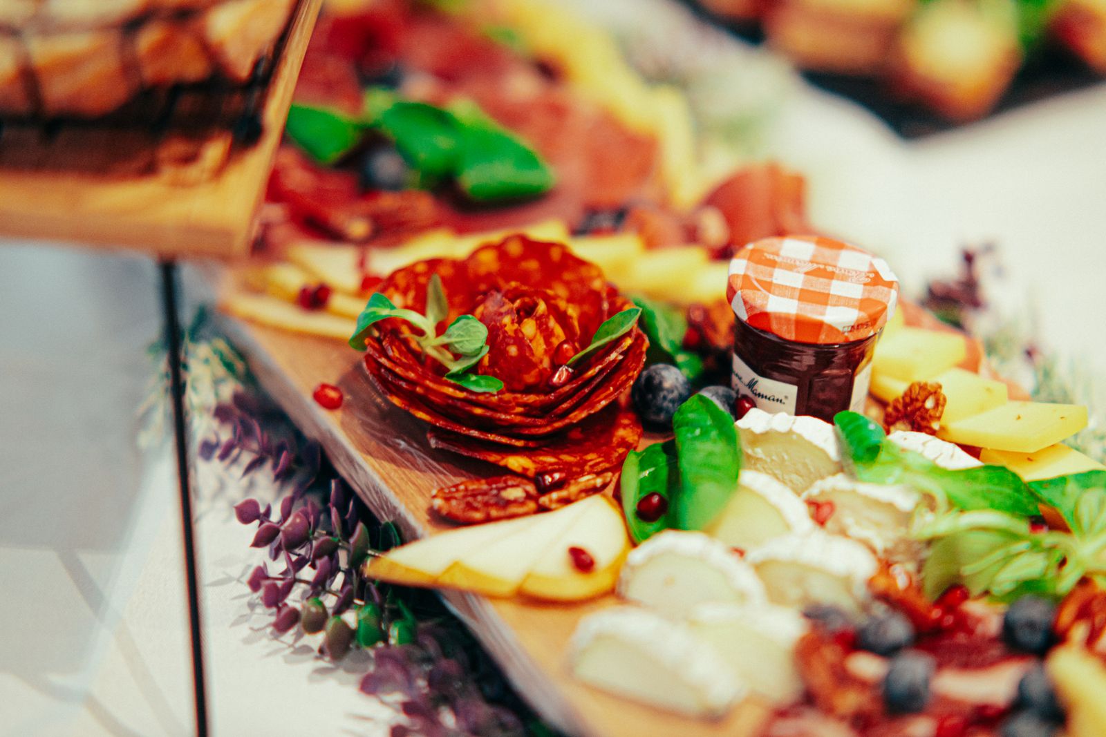 Cheese, salami, ham and a pie on the deli board