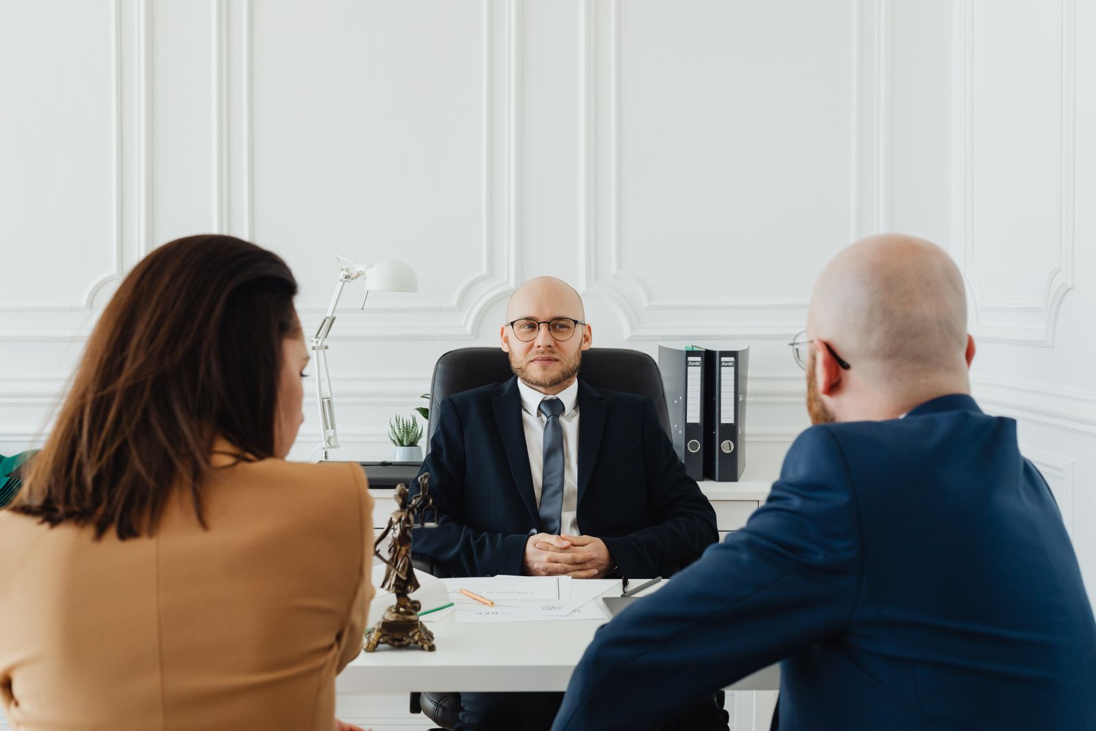 A lawyer meeting a client in the office